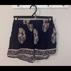 Stretchy dark blue shorts. Size small. High waisted